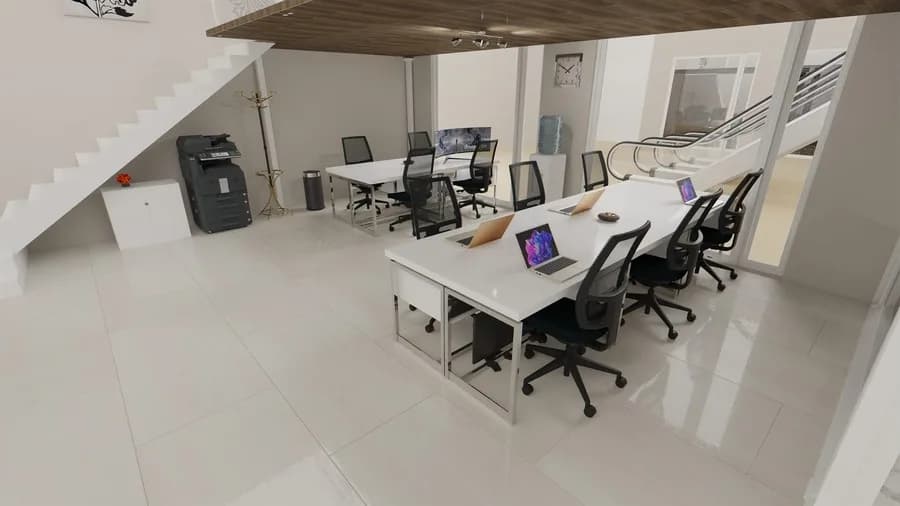A coworking floor at Artana Offices, desks and seating under a wood-panelled ceiling